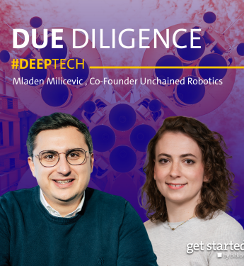 Two smiling individuals: a man in a blue sweater and glasses, and a woman in a light top. Background features tech-themed graphics.