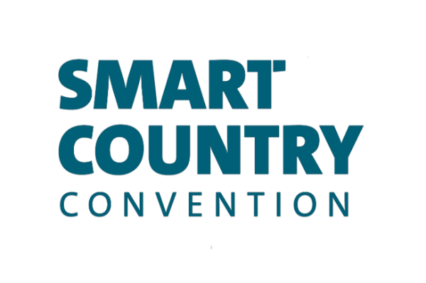 Logo mit dem Text „SMART COUNTRY CONVENTION“ in dunkeltürkiser Schrift auf weißem Hintergrund.